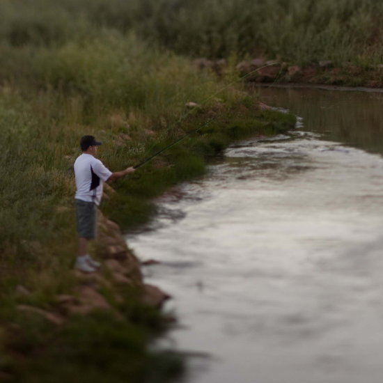 A man fishing our private waters