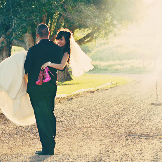The groom carries the bride away