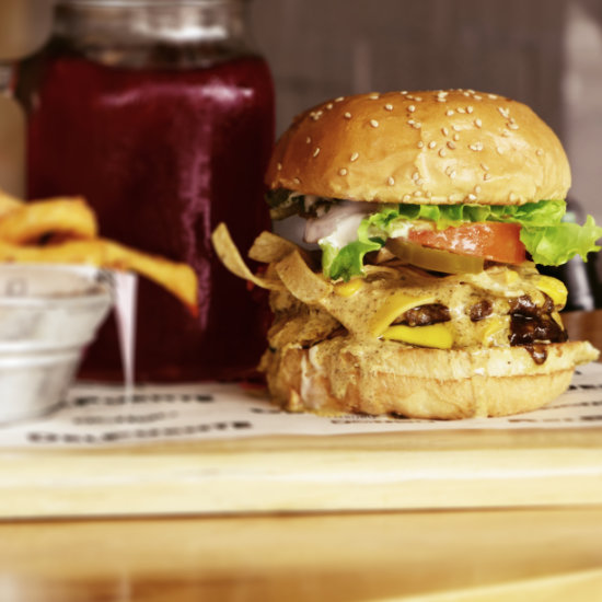 Photo of a juicy burger. Link to the area restaurants page