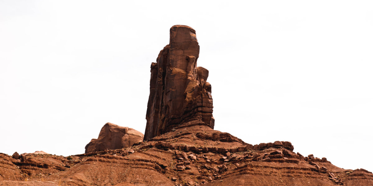 A towering sandstone monolith in the monument