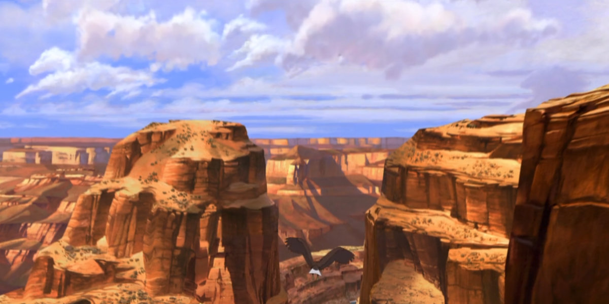 An animated scene of an eagle flying through the Grand Canyon