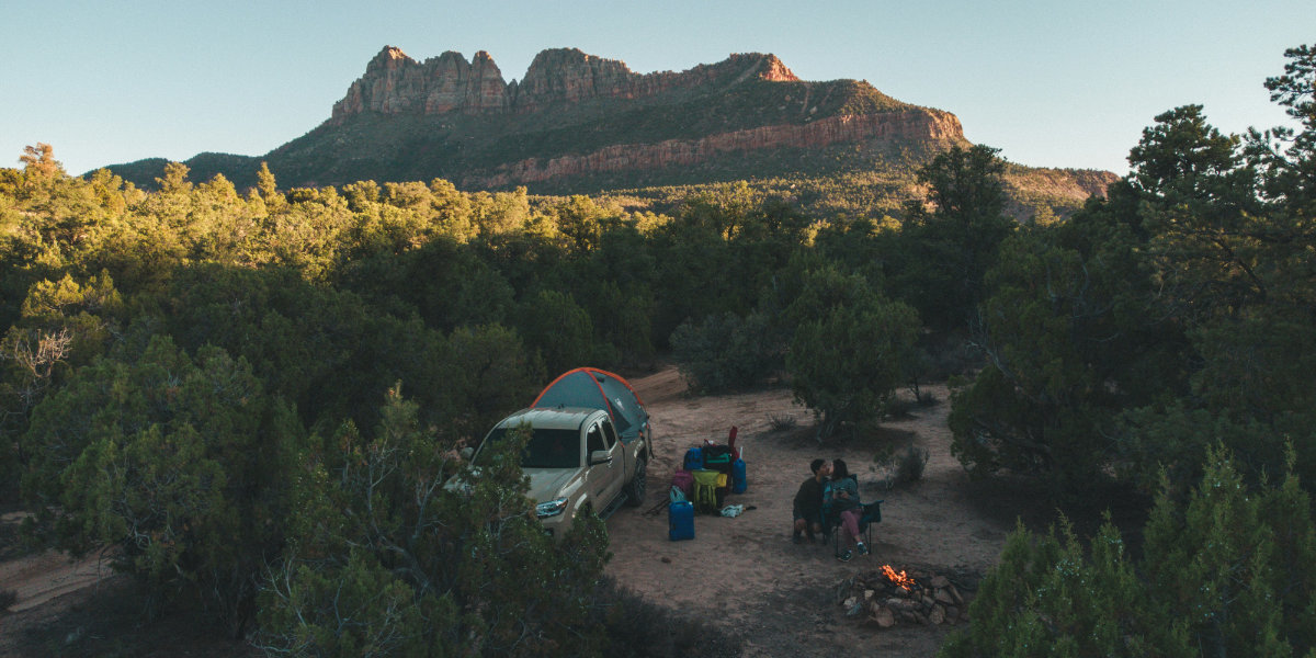 A couple camp in Zion National Park