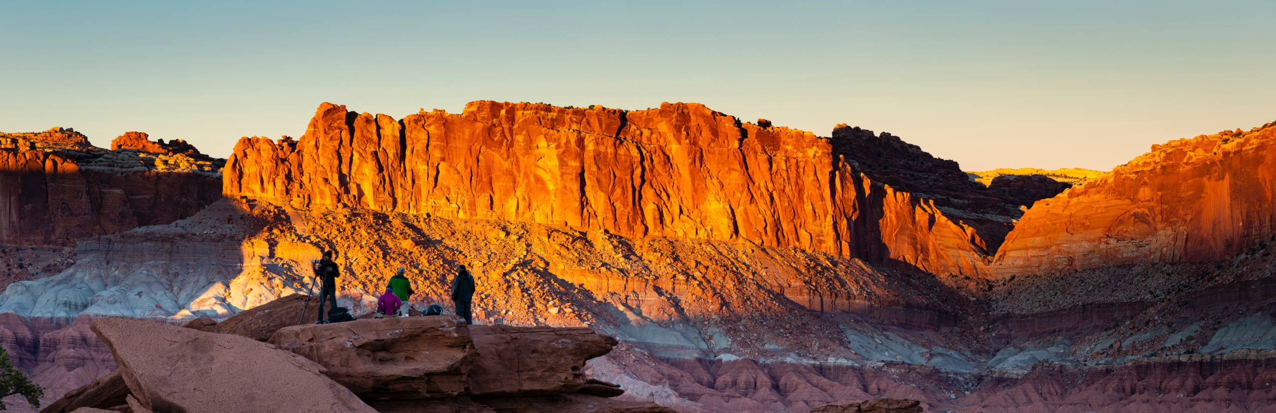 Sunset light on red rock cliffs in Capitol Reef country